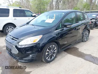2017 Ford C-Max Energi Titanium with VIN 1FADP5FU2HL115199, listed as a IAAI auction lot 42001944 with 57,609 mi miles. Bid and sale history available at carsss.com. Image 17.