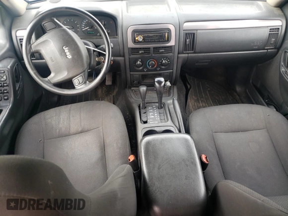 2004 Jeep Grand Cherokee Laredo z VIN 1J4GW48S14C288605, wystawiony jako Copart lot #60204815 z przebiegiem 247 816 mil mil oraz Szkoda całkowita • Salvage title. Historia ofert i sprzedaży dostępna na DreamBid. Obrazek 8.