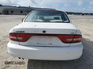 1995 Mitsubishi Galant ES with VIN 4A3AJ56G4SE193873, listed as a Copart auction lot 71312154 with 57,695 mi miles and Clean Title. Bid and sale history available at carsss.com. Image 6.