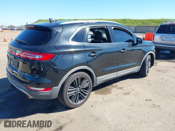 2015 Lincoln MKC with VIN 5LMTJ2AH6FUJ13505, listed as a IAAI auction lot 41871254 with 107,924 mi miles. Bid and sale history available at carsss.com. Image 4.