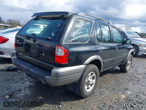 2001 Isuzu Rodeo z VIN 42CK58W9143610580, wystawiony jako IAAI lot #41939199 z przebiegiem 125 754 mil mil oraz . Historia ofert i sprzedaży dostępna na DreamBid. Obrazek 4.