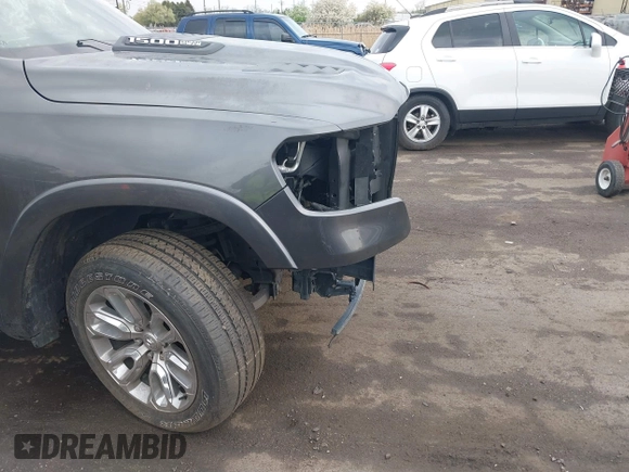 2022 Ram 1500 Laramie with VIN 1C6SRFJT3NN400159, listed as a IAAI auction lot 42167812 with 16,790 mi miles and . Bid and sale history available at DreamBid. Image 19.