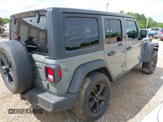 2020 Jeep Wrangler Unlimited Freedom with VIN 1C4HJXDG2LW186027, listed as a IAAI auction lot 42449664 with 87,869 mi miles and . Bid and sale history available at DreamBid. Image 4.