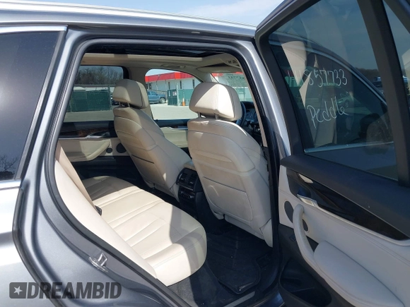 2015 BMW X5 xDrive35i with VIN 5UXKR0C53F0K60910, listed as a IAAI auction lot 41857733 with 153,583 mi miles. Bid and sale history available at carsss.com. Image 8.