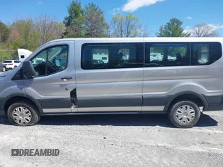 2016 Ford Transit Wagon XL with VIN 1FBZX2ZM8GKA69218, listed as a IAAI auction lot 42027106 with 311,419 mi miles. Bid and sale history available at carsss.com. Image 14.