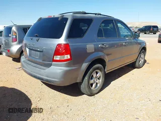 2006 Kia Sorento LX with VIN KNDJD733X65552995, listed as a IAAI auction lot 42058232 with 116,378 mi miles and . Bid and sale history available at DreamBid. Image 4.