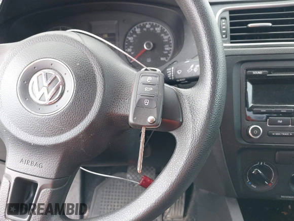 2014 Volkswagen Jetta S with VIN 3VW2K7AJ2EM438149, listed as a IAAI auction lot 42594264 with 54,675 mi miles and . Bid and sale history available at DreamBid. Image 11.