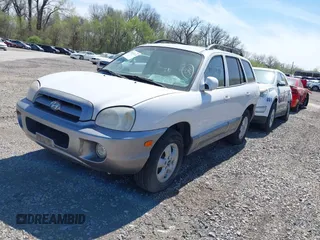 2005 Hyundai Santa Fe GLS with VIN KM8SC13D95U888747, listed as a IAAI auction lot 38833174 with 154,111 mi miles. Bid and sale history available at carsss.com. Image 2.