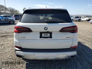 2020 BMW X5 xDrive40i with VIN 5UXCR6C02L9C46986, listed as a Copart auction lot 49099615 with Not provided miles and Salvage title. Bid and sale history available at DreamBid. Image 6.