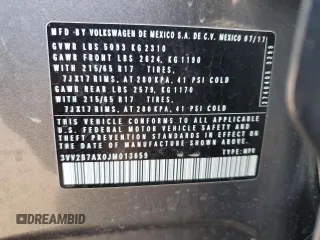2018 Volkswagen Tiguan SEL z VIN 3VV2B7AX0JM013659, wystawiony jako Copart lot #54154665 z przebiegiem 86 603 mil mil oraz Szkoda całkowita • Salvage title. Historia ofert i sprzedaży dostępna na DreamBid. Obrazek 14.