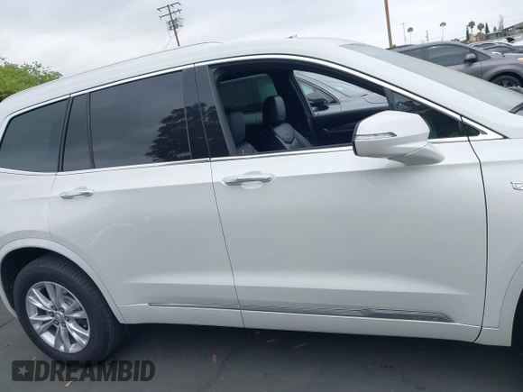 2021 Cadillac XT6 Luxury with VIN 1GYKPAR47MZ221123, listed as a IAAI auction lot 42374772 with 69,829 mi miles and . Bid and sale history available at DreamBid. Image 14.