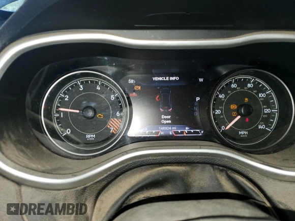 2014 Jeep Cherokee Trailhawk z VIN 1C4PJMBB0EW309277, wystawiony jako Copart lot #52370565 z przebiegiem 148 924 mil mil oraz Czysty tytuł • Clean title. Historia ofert i sprzedaży dostępna na DreamBid. Obrazek 9.