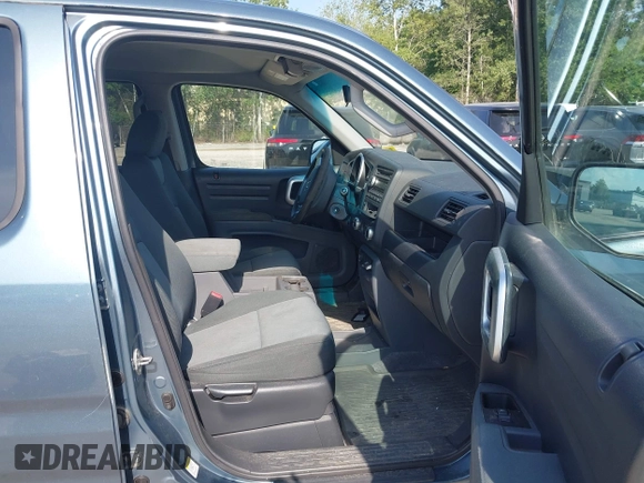 2007 Honda Ridgeline RT z VIN 2HJYK16247H551304, wystawiony jako IAAI lot #42563119 z przebiegiem 160 795 mil mil oraz . Historia ofert i sprzedaży dostępna na DreamBid. Obrazek 5.