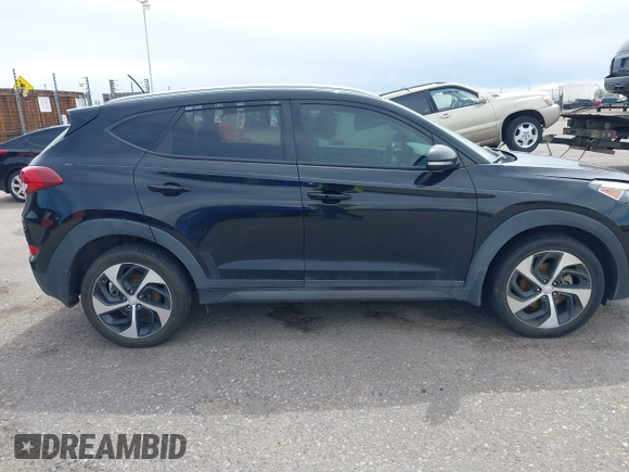 2016 Hyundai Tucson Limited with VIN KM8J33A27GU181240, listed as a IAAI auction lot 42183028 with 104,557 mi miles. Bid and sale history available at carsss.com. Image 13.