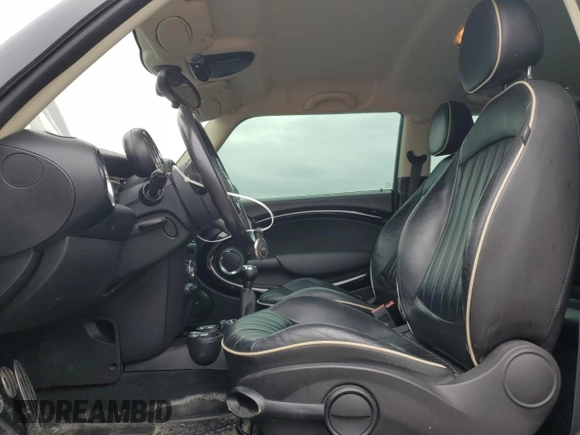 2012 MINI Hardtop S with VIN WMWSV3C57CTY25391, listed as a Copart auction lot 59684835 with 217,246 mi miles and Salvage title. Bid and sale history available at DreamBid. Image 7.