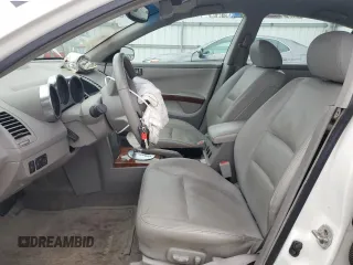 2004 Nissan Maxima SL with VIN 1N4BA41E74C824398, listed as a Copart auction lot 51312995 with 143,549 mi miles and Salvage Title. Bid and sale history available at DreamBid. Image 7.