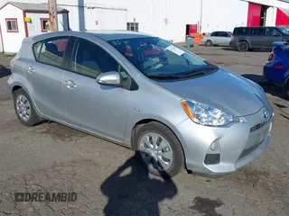 2014 Toyota Prius One z VIN JTDKDTB32E1574607, wystawiony jako IAAI lot #41724312 z przebiegiem 102 612 mil mil oraz . Historia ofert i sprzedaży dostępna na DreamBid. Obrazek 1.
