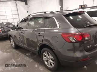 2015 Mazda CX-9 Sport with VIN JM3TB2BA1F0453620, listed as a IAAI auction lot 41330887 with 119,219 mi miles and . Bid and sale history available at carsss.com. Image 14.