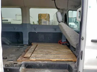 2015 Ford Transit XL with VIN 1FBAX2CM6FKA52776, listed as a Copart auction lot 56257115 with 270,005 mi miles and Salvage title. Bid and sale history available at DreamBid. Image 11.