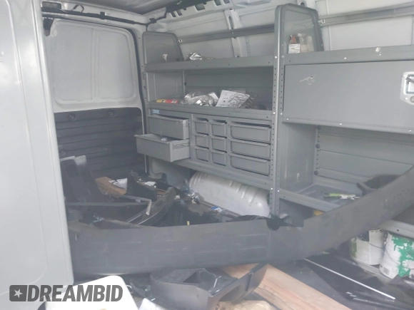 2023 Chevrolet Express Cargo with VIN 1GCWGAFP2P1100606, listed as a IAAI auction lot 42450171 with 34,000 mi miles and . Bid and sale history available at DreamBid. Image 8.