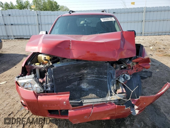 2012 Ford Escape XLT with VIN 1FMCU9DG7CKC66066, listed as a Copart auction lot 59592745 with 138,248 mi miles and Salvage title. Bid and sale history available at DreamBid. Image 5.