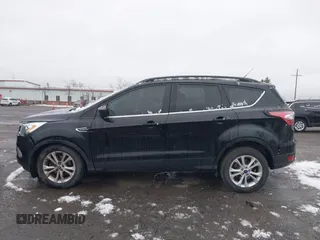 2017 Ford Escape SE with VIN 1FMCU0GD5HUD08968, listed as a IAAI auction lot 42008576 with 95,363 mi miles and . Bid and sale history available at DreamBid. Image 14.