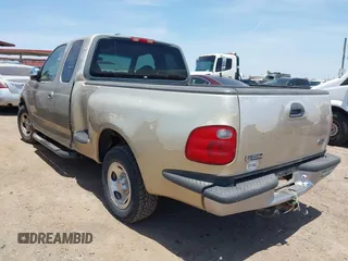 2000 Ford F-150 XL with VIN 1FTRX07W6YKB19703, listed as a IAAI auction lot 42375355 with Not provided miles and . Bid and sale history available at DreamBid. Image 3.