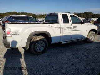 2006 Mitsubishi Raider Duro Cross z VIN 1Z7HT32N86S547894, wystawiony jako Copart lot #75597864 z przebiegiem Nie podano mil oraz Szkoda całkowita • Salvage title. Historia ofert i sprzedaży dostępna na DreamBid. Obrazek 3.