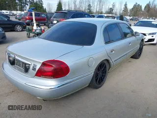 2002 Lincoln Continental with VIN 1LNHM97V92Y606541, listed as a IAAI auction lot 41719348 with 235,967 mi miles and . Bid and sale history available at DreamBid. Image 4.