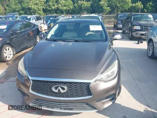 2017 Infiniti QX30 Premium z VIN SJKCH5CP4HA023330, wystawiony jako IAAI lot #42407253 z przebiegiem 132 317 mil mil oraz . Historia ofert i sprzedaży dostępna na DreamBid. Obrazek 6.