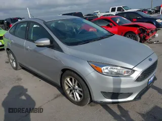 2015 Ford Focus SE with VIN 1FADP3F2XFL340583, listed as a IAAI auction lot 42099224 with 111,970 mi miles. Bid and sale history available at carsss.com. Image 1.
