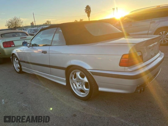 1999 BMW 3 Series M3 with VIN WBSBK0331XEC40420, listed as a Copart auction lot 82169664 with 129,936 mi miles and Clean Title. Bid and sale history available at carsss.com. Image 4.