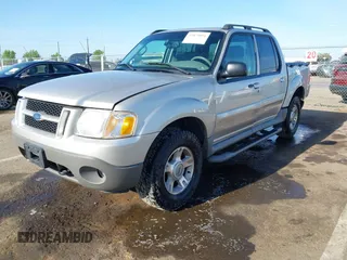 2003 Ford Explorer Sport Trac XLS z VIN 1FMZU77E13UC70465, wystawiony jako IAAI lot #42079056 z przebiegiem 123 046 mil mil oraz . Historia ofert i sprzedaży dostępna na DreamBid. Obrazek 2.