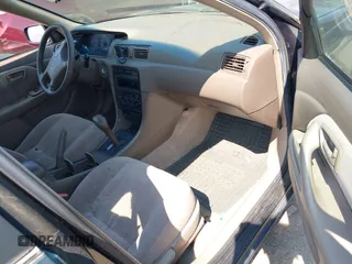 1997 Toyota Camry LE with VIN JT2BG22K5V0073783, listed as a IAAI auction lot 42409561 with 149,560 mi miles and . Bid and sale history available at DreamBid. Image 5.