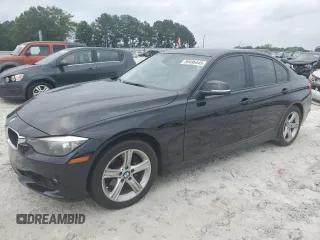 2013 BMW 3 Series 328i with VIN WBA3A5C50DF354910, listed as a Copart auction lot 59496445 with 133,089 mi miles and Salvage title. Bid and sale history available at DreamBid. Image 1.