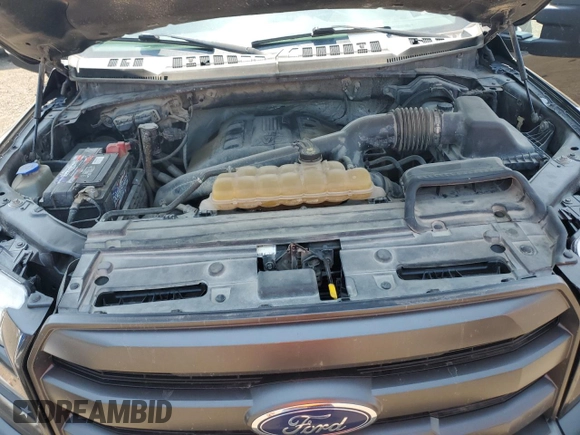 2015 Ford F-150 XLT with VIN 1FTEW1EG4FFA60210, listed as a Copart auction lot 59752825 with 323,475 mi miles and Salvage title. Bid and sale history available at DreamBid. Image 11.