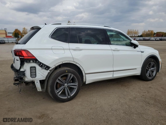 2020 Volkswagen Tiguan SEL Premium R-Line with VIN 3VV4B7AX8LM033024, listed as a Copart auction lot 77354494 with 127,247 mi miles and Salvage Title. Bid and sale history available at carsss.com. Image 3.