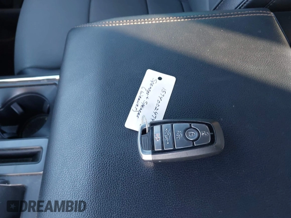 2022 Ford F-150 Lightning Pro with VIN 1FTVW1EV4NWG04301, listed as a IAAI auction lot 41821787 with 38,417 mi miles and . Bid and sale history available at DreamBid. Image 11.