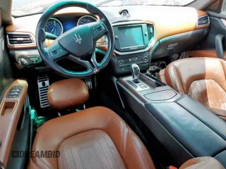 2014 Maserati Ghibli S Q4 with VIN ZAM57RTA8E1097777, listed as a Copart auction lot 59604665 with 86,135 mi miles and Salvage title. Bid and sale history available at DreamBid. Image 8.