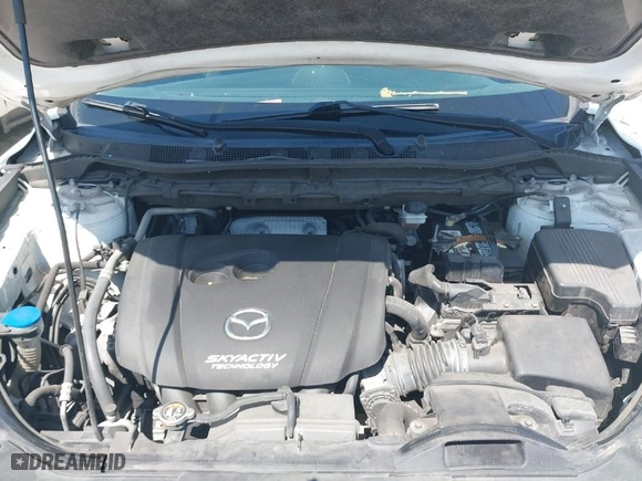 2016 Mazda CX-5 Touring with VIN JM3KE4CY1G0914990, listed as a IAAI auction lot 42030264 with 147,578 mi miles. Bid and sale history available at carsss.com. Image 10.