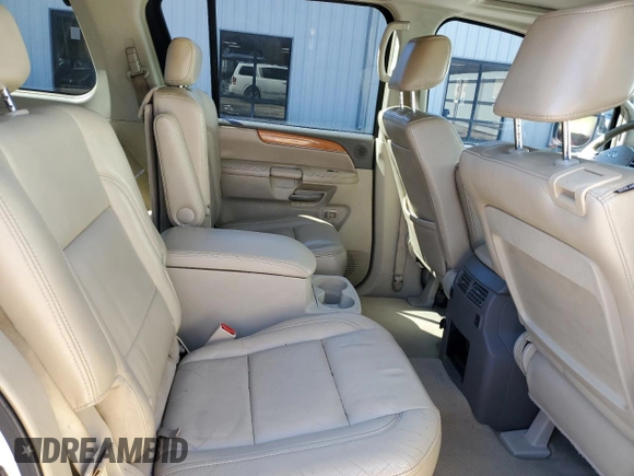 2010 Infiniti QX56 with VIN 5N3ZA0NF3AN905874, listed as a Copart auction lot 58995905 with 284,995 mi miles and Salvage title. Bid and sale history available at DreamBid. Image 11.