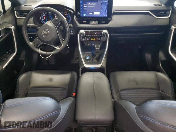 2023 Toyota RAV4 Hybrid XSE with VIN JTME6RFV5PD537302, listed as a Copart auction lot 58723145 with 37,829 mi miles and Salvage title. Bid and sale history available at DreamBid. Image 8.