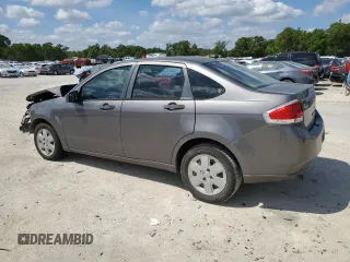 2009 Ford Focus S with VIN 1FAHP34N79W178011, listed as a Copart auction lot 51120195 with 123,930 mi miles and Salvage Title. Bid and sale history available at carsss.com. Image 2.