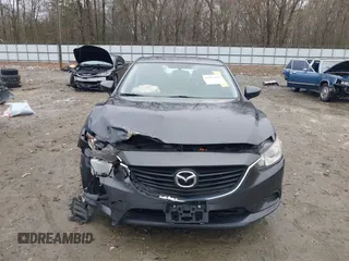 2016 Mazda Mazda6 i Touring with VIN JM1GJ1V56G1462637, listed as a IAAI auction lot 41603296 with 143,931 mi miles. Bid and sale history available at carsss.com. Image 12.