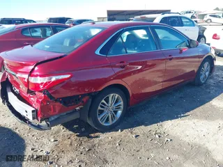 2015 Toyota Camry Hybrid LE with VIN 4T1BD1FK6FU170534, listed as a IAAI auction lot 41211638 with 120,059 mi miles. Bid and sale history available at carsss.com. Image 4.