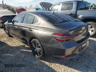 2023 Genesis G70 2.0T with VIN KMTG34TA4PU104352, listed as a Copart auction lot 76000484 with 27,548 mi miles and Salvage Title. Bid and sale history available at DreamBid. Image 2.