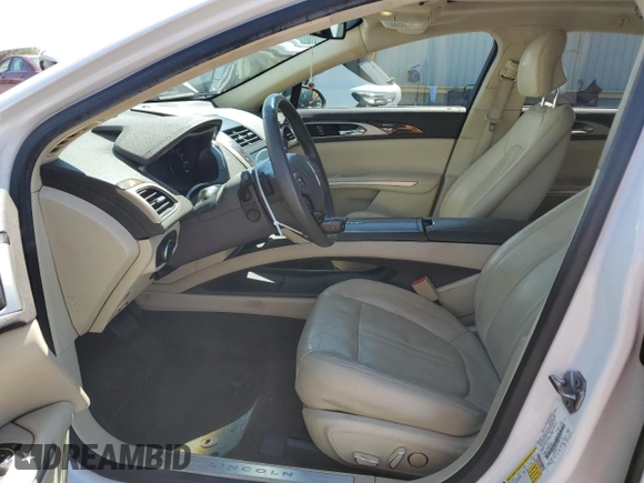 2013 Lincoln MKZ z VIN 3LN6L2GKXDR814615, wystawiony jako Copart lot #65654335 z przebiegiem 100 510 mil mil oraz Szkoda całkowita • Salvage title. Historia ofert i sprzedaży dostępna na DreamBid. Obrazek 7.