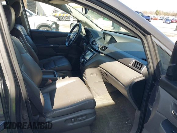2014 Honda Odyssey Touring with VIN 5FNRL5H97EB101169, listed as a IAAI auction lot 41869233 with 142,147 mi miles and . Bid and sale history available at DreamBid. Image 5.