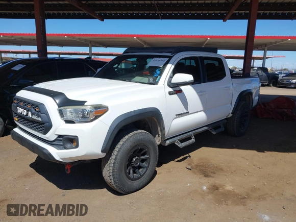2016 Toyota Tacoma SR with VIN 5TFCZ5ANXGX028464, listed as a IAAI auction lot 41834385 with 124,407 mi miles and . Bid and sale history available at DreamBid. Image 16.