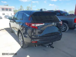2021 Acura RDX w/Technology Package with VIN 5J8TC1H54ML016041, listed as a IAAI auction lot 41855161 with 33,876 mi miles. Bid and sale history available at carsss.com. Image 3.